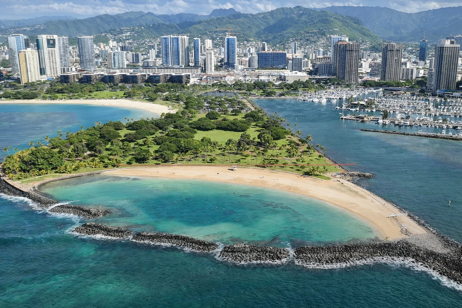 Magic Island with Ala Moana and Oahu's mountains in the background