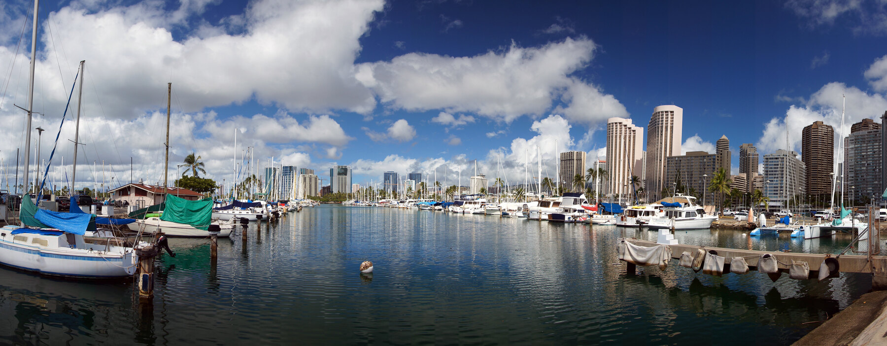 Sailboats and Waikīkī towers at Ala Wai Small Boat Harbor