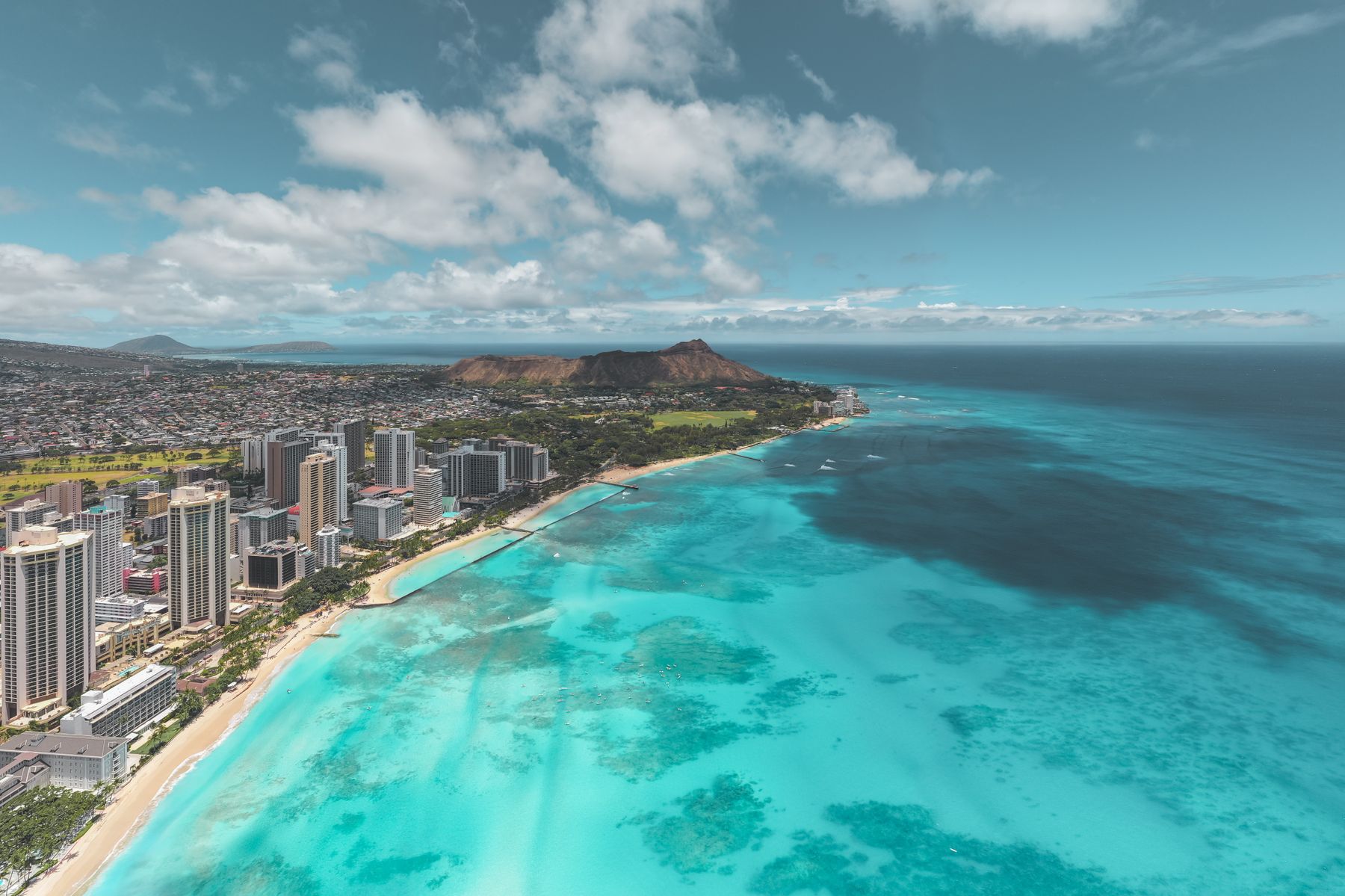 Aerial view of the Waikiki shoreline and Diamond Head